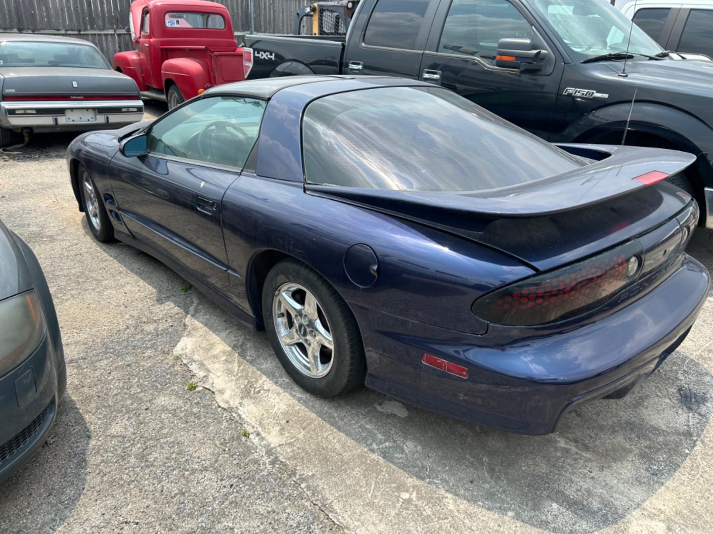1999 Blue Pontiac Firebird (2G2FV22G6X2) with an 5.7L V8 F OHV engine, Automatic transmission, located at 1687 Business 35 S, New Braunfels, TX, 78130, (830) 625-7159, 29.655487, -98.051491 - Photo#1